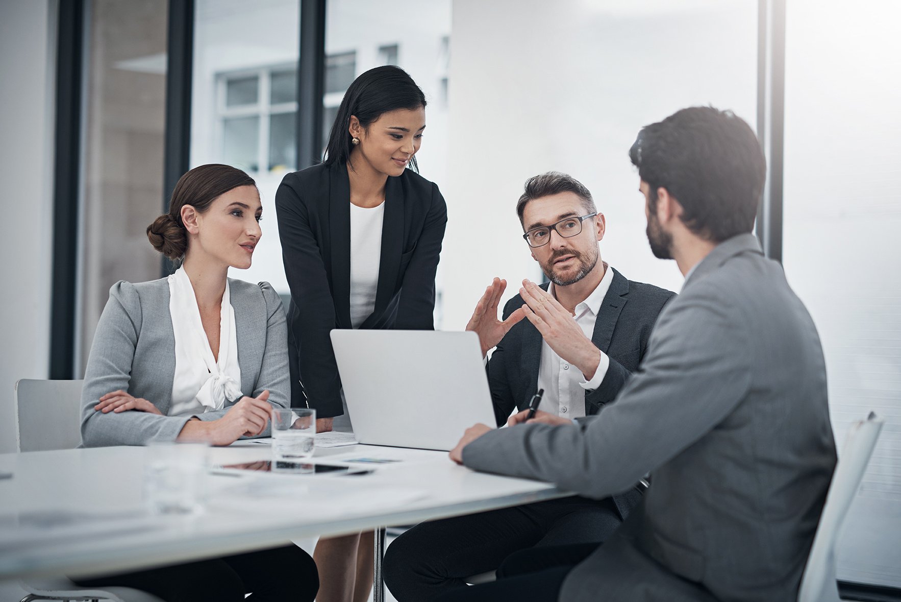 executive-explaining-with-gestures-as-832151599