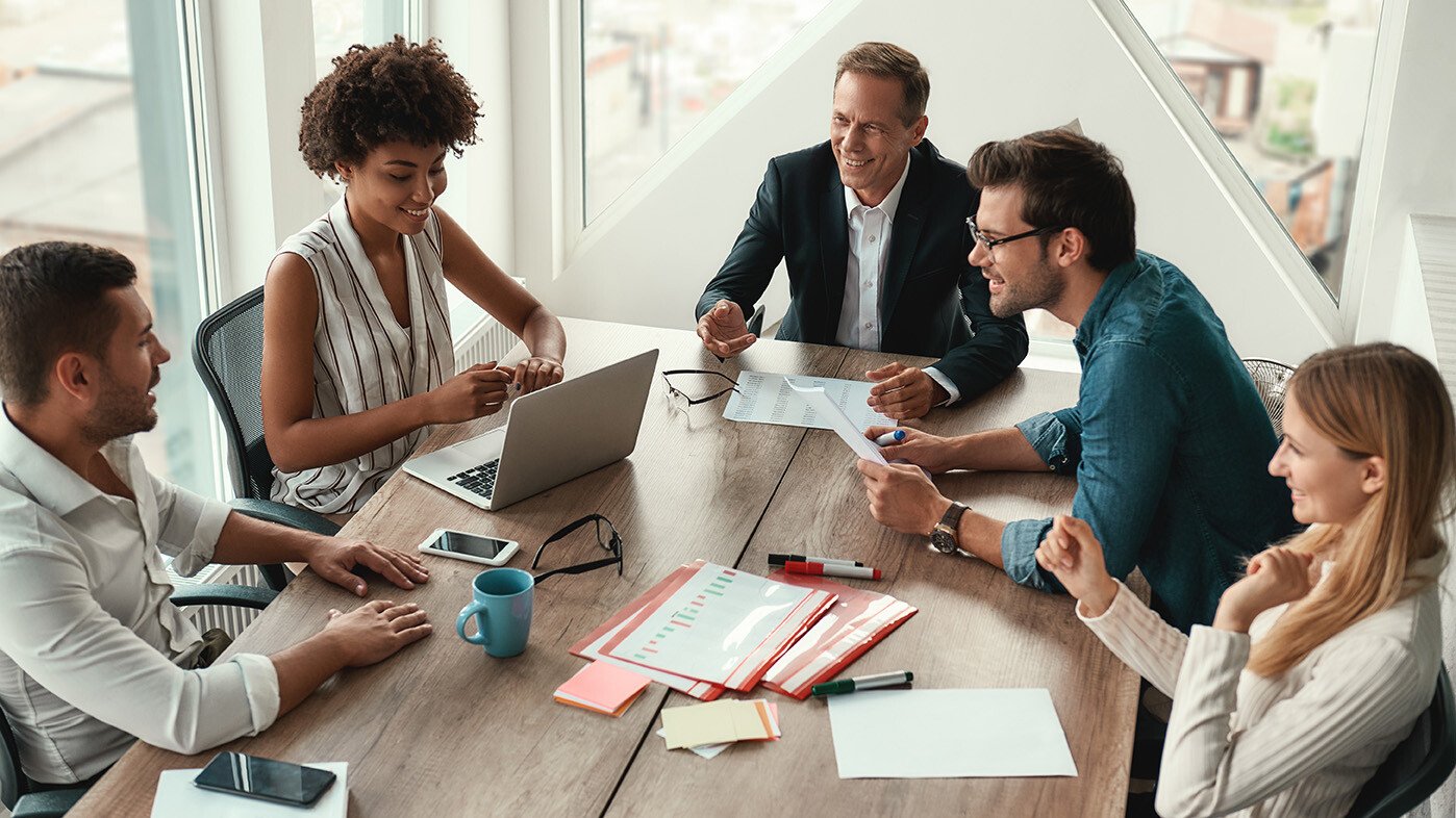 Office workers collaborating in a conference room