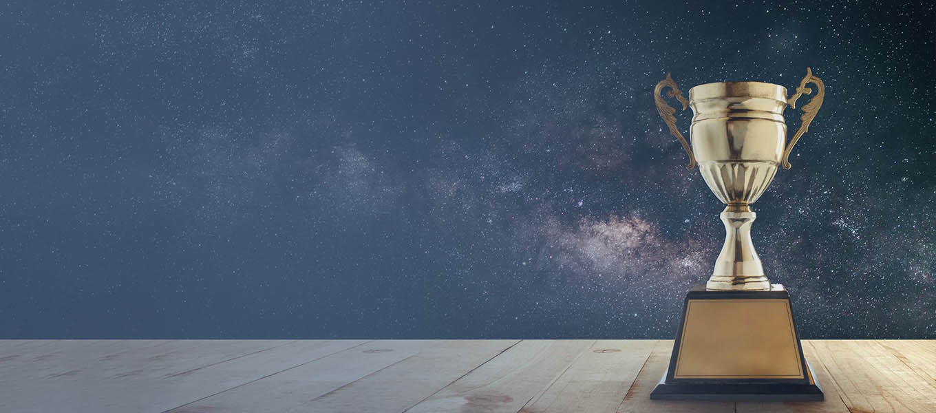 trophy on shelf with a galaxy background