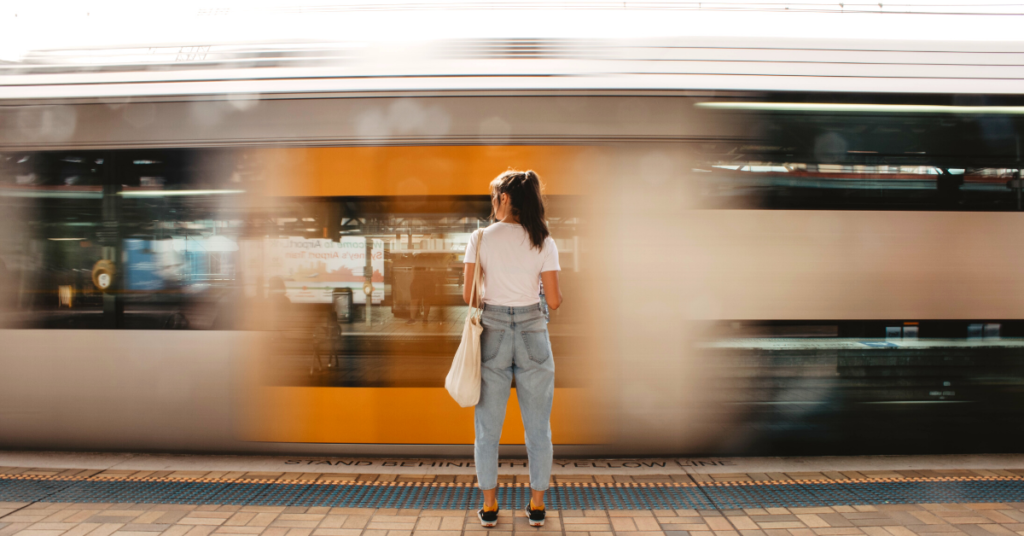 woman in front of yellow subway door