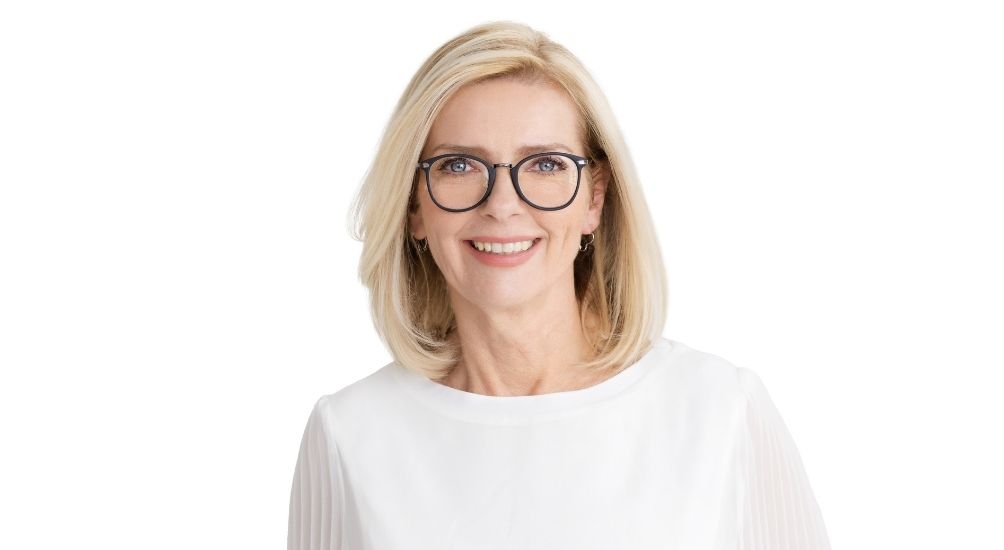 woman executive with white blouse and glasses